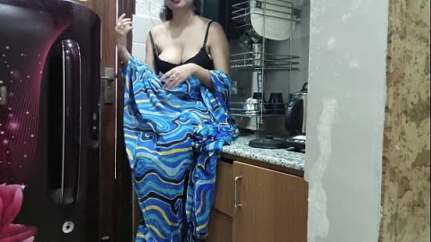 Indian stepmom watches and enters her stepson's Kitchen to fuck him